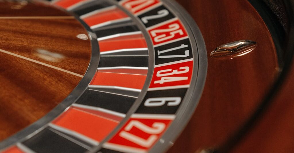 Detailed close-up of a roulette wheel in a casino, focusing on numbers and colors.